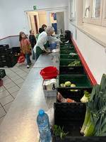 Quelle: Ulrike Pietzcker Die Erstkommunionkinder besuchen den Tafelladen